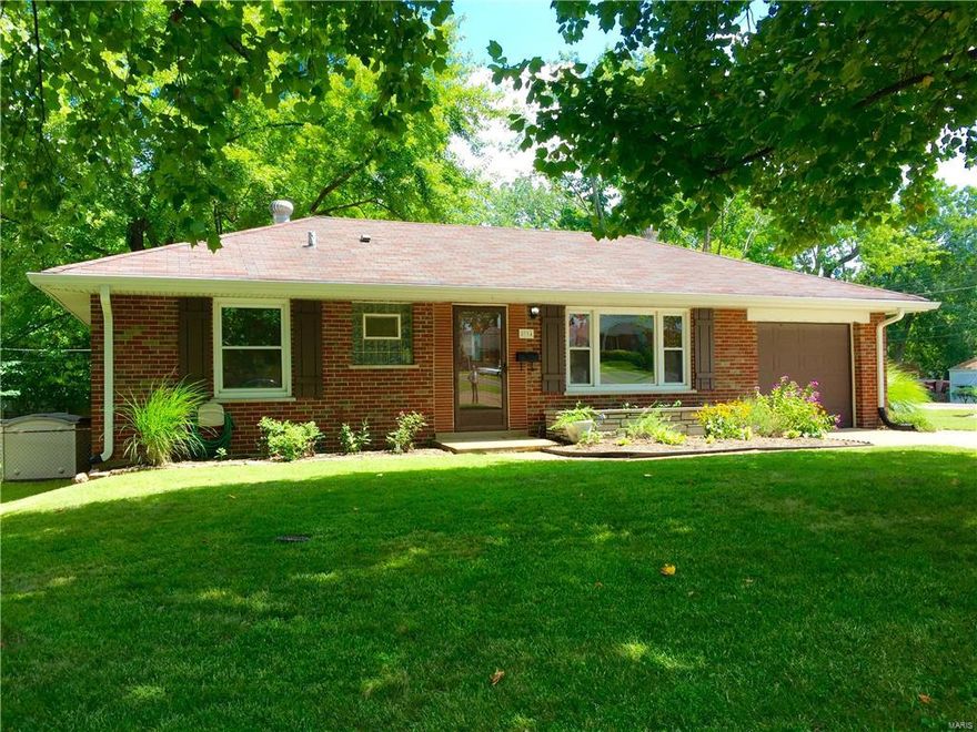 SHOWINGS BEGIN FRIDAY, AUGUST 12, AT 11:00AM. First Open House on Sunday, August 14, from 1-4pm. Do you want a home that is turn key, ready to move in? Look no further, this is it. Totally updated kitchen with amazing cabinet space, deep sink, Silestone countertops, Whirlpool stove, dishwasher and built-in microwave. Kenmore refrigerator, plus the washer and dryer are included. Updated bathrooms, generous closet space and tilt-in windows.. Gorgeous hardwood floors and wood doors. Spacious lower level is freshly painted. Bonus updated bathroom with shower. Spacious work bench. Garage door opens to kitchen. Expansive corner lot with mature trees. Pride of ownership evident throughout. Pre-approval letter (POF if cash sale) required with all contracts. No contracts contingent on house sale. Basement fridge & deep freeze not included. Seller can accommodate a quick closing. Sellers to review and respond to contracts after Open House, so no response times before 7:00pm on Sunday, Aug 14.