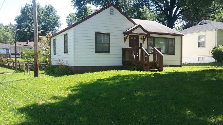 Affordable opportunity for a 1st time home buyer or great investment property.  This home needs updating and is priced to sell quickly. This property is being "Sold As Is".  Seller to do no repairs or inspections. Spacious 2 bedrms, full bath on the main floor.  Possible recreation room in the lower level, plenty of storage room.  Spacious backyard. Refrigerator and gas range to stay.  This home is liveable just needs your TLC.  Take time to view this home.  There is no sign.