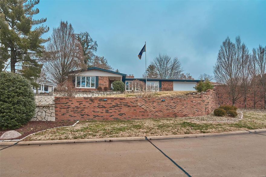 This beautiful, spacious brick ranch in Sunset Hills promises to amaze! The home opens to a bright foyer leading to the large living/dining combination featuring gleaming bamboo floors, floor-ceiling windows & a fireplace as the focal point. The modern kitchen boasts plentiful cabinet & counter space, stainless steal appliances, farmhouse sink and breakfast room. The adjoining family room, also featuring a fireplace, is the perfect spot to relax! The master suite offers soft carpeting, plenty of closet space & full bath. Each of the additional 3 bedrooms are comfortably sized with ample closet space. A full updated bath completes this level. The finished lower level offers vinyl plank flooring, fireplace & creates prime entertainment space with sitting, bar, game & powder rooms. The large backyard & patio are sure to be the highlight of outdoor entertaining! The covered front porch & tasteful landscaping only adds to the curb appeal! Close to everything that Sunset Hills has to offer!