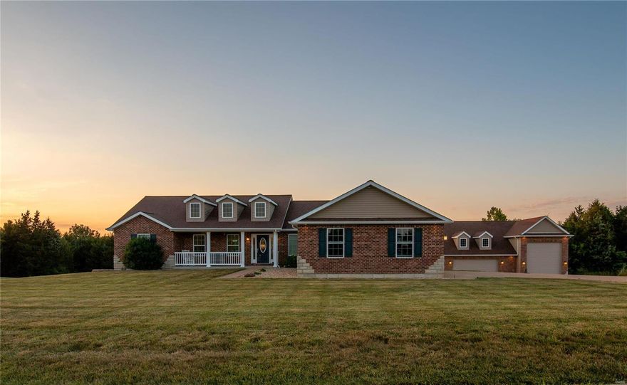 This home is the American Dream. As one walks through the front door, the open concept living room, dinning, and kitchen combo greets you with high vaulted ceilings and lots of natural light. This home has a separated bedroom layout to include a Master bedroom with private suite and 2 spacious bedrooms. Also on the main level one will find 3 full bathrooms and mud room that includes washer and dryer hookup. So much closet space and storage throughout. Central vac is also included.  The walkout basement has 1 full bathroom and 1 bedroom with additional recreational area and kitchen which is perfect for entertaining guests. The large back patio includes a firepit area and Woodline for your peace of mind. This home has a 3 car attached garage and a 3 car detached garage. The 3 car detached garage has a spot for your RV, Camper or side hustle! This home is the American Dream and will check all the boxes!