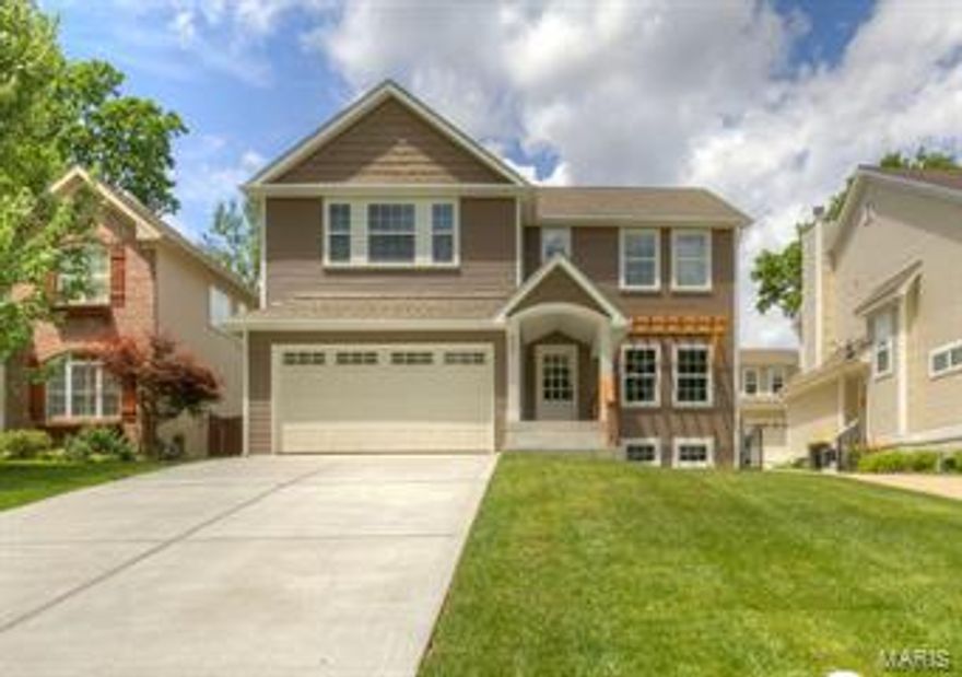 CUSTOM BUILT 2 STORY, 5 BED/3.5 BATH IN KIRKWOOD W/APPROX. 3,300 SQ.FT. High end finishes galore. Main level features large open floor plan,great room w/gas fireplace-tile surround/custom mantle, kitchen w/custom 42"maple cabinets,granite countertops,Kitchen Aide Appliance Package, Breakfast room,formal dining w/wainscote crown molding and powder room.Main level has 3-1/4"oak flooring. 4 Bed Upper Level. Large master w/sitting area, Master bath has 5' pedestal tub,adult height double bowl vanity,tiled shower w/glass door,walk-in closet. Other 3 bedrooms share full bath. Laundry is on upper level convenient to bedrooms. LL has a large family room,5 bedroom and another full bath.5-1/4" base molding throughout 1st & 2nd floor,3-1/4" window/case molding 1st & 2nd fl.Drain tile system w/sump pump & pit.2 car garage.Extensive can lighting throughout.Access coverage patio in back thru french doors.Too many upgrades to list all.Gorgeous home.