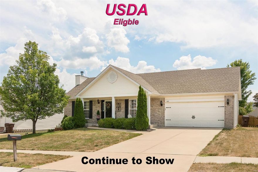 NOW ACCEPTING BACKUP CONTRACTS! Beautiful Brick front ranch with great curb appeal. Great room has vaulted ceilings & a raised hearth fireplace. The formal dining room is just across the open foyer with beautiful column details. The Eat in kitchen has an island, pantry, 42" updated cabinets, hardwood floors & a pass through to the great room. Sliding glass door leads you out to the over sized patio surrounded by beautiful landscaping & spacious fenced backyard for kids or pets. The generous master suite has a vaulted ceiling and offers a double bowl vanity, a separate tub and shower and a huge walk in closet. 2 more nice sized bedrooms are served by hall bath. Main floor laundry has newer flooring, and leads out to the 2 car o/s garage.  Full sized basement with rough in, room to finish into rec area, office, family room or your choice. Also has plenty of storage space with shelving. Home is close to transportation, shopping, schools, and much more.  This property is in USDA territory.