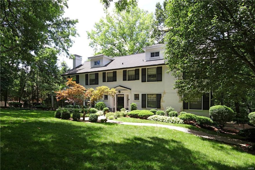 This classic Ladue home is available for the first time in 40 years! The first floor offers a living room with bay window , wet bar & fireplace and leads to the gracious dining room complete with crown molding.  The over sized kitchen adjoins the light filled breakfast room. A cozy den with it’s own bath and family room complete the first floor.  The second floor has 6 bedrooms and 2 baths with 2 light filled sitting rooms.  An exceptional  opportunity to renovate the existing home or build your dream home on a 1.5 acre lot on this signature street in the heart of Ladue. Additional Rooms: Sun Room