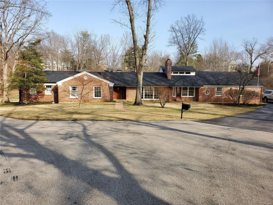 This beautifully redesigned multi level ranch has to be viewed to truly appreciate. This 5,200 square foot home is full of custom features tastefully done. Viking range, built-in refrigerator, glass front cabinetry, walk-in pantry "17x8", 5 bedrooms, 4 baths, Library, Office, Foyer, Rec. rooms, Two bar areas and a "Private" separate living quarters with kitchen and full bath with separate entry off back patio area. All on a level "1.5 plus acre lot" and a private street. Best of all located in Ladue School District. Rated #1 school district in Missouri by Niche for 2022. Additional Rooms: Mud Room, Sun Room