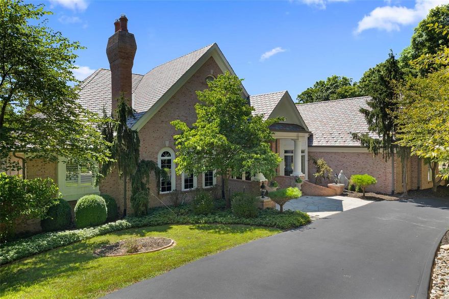 Elegance and Nature tucked away in a Private Gated community with amenities galore is what you get with this Spectacular Atrium Ranch perched high in the Bluffs of St. Albans. This stately and unique home is designed perfectly for all of your needs and desires. The outdoor salt water pool is surrounded with multi level decking and wooded background and offers a beautiful setting for relaxing or entertaining. As you walk into this Amazing home you are greeted by beautiful marble floors and 14 ft. ceilings. Custom Millwork and detail is etched in every room of this home. Consider all of the many custom features including 7 Fireplaces, 2 Master suites with sitting rooms -  one on the main level and one on the lower level. Sunning Den/Library with rich wood tones, 4 Car Garage, Billiards Room, Full Finished lower level with Custom Bar and Walk Out. T Shaped Atrium ranch Staircase to the lower level.  This Home was Built by DeShetler Homes Inc. By Appointment only!