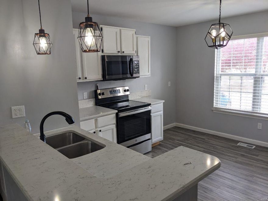 Opportunity Awaits! This beautiful 2 bedroom, full bath with a fantastic large basement with bonus room, storage and convenience of upstairs and downstairs washer and dryer hookups.  Large living room, condo living at its best.  A must see! Vacant for convenient viewing. Additional Rooms: Workshop/Hobby Area Location: Ground Level