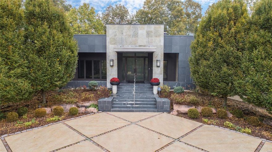 Like an oasis tucked away-be amazed by this one-of-a-kind residence to call home. The stunning façade leads to a wide open floor plan designed for entertaining & boasting gorgeous oak flooring, wood burning fire place, soaring ceilings & updated French doors leading to the stylish salt water pool & slate patios. The kitchen is a chef's dream come true with abundant cabinet & counter space.The first floor layout offers the option of 2 master suites-one with bonus office/sitting area, & one of the largest walk-in closets you'll find, separate shower & contemporary soaking tub. Outside your master bath - private deck & hot tub featuring your personal waterfall.  The east wing of the home offers an additional bed/bath suite & two more bedrooms & full bath. Lower level hosts a large media room, full bath, cedar closet & walk out to your fenced in yard. There is still an enormous unfinished area that is just waiting for more amazing living space. *Be sure to check  out the Video Tour * Additional Rooms: Mud Room