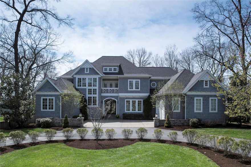 This breathtaking, custom-built, Michael Lauren home was constructed with the highest level of quality. The light filled, open concept living spaces flow beautifully making it ideal for entertaining and the gourmet kitchen features stainless steel Thermador appliances, 2 dishwashers (1 Thermador and 1 Miele for delicate loads) as well as an icemaker and wine refrigerator. The screen porch, just off the kitchen, can be used well past summer with its gas fireplace and TV mounted above. St. Louis Magazine named it one of the 10 Most Beautiful Homes in St. Louis in 2017 because of the stunning curb appeal and the gorgeous lot with mature trees, but inside it is just as special. Crown molding, wall sconces, built-in speakers, marble tile, and plantation shutters are just a few of the special, high quality features.  This home offers the modern conveniences and amenities all buyers are looking for and still fits perfectly into its historic Webster Groves neighborhood.