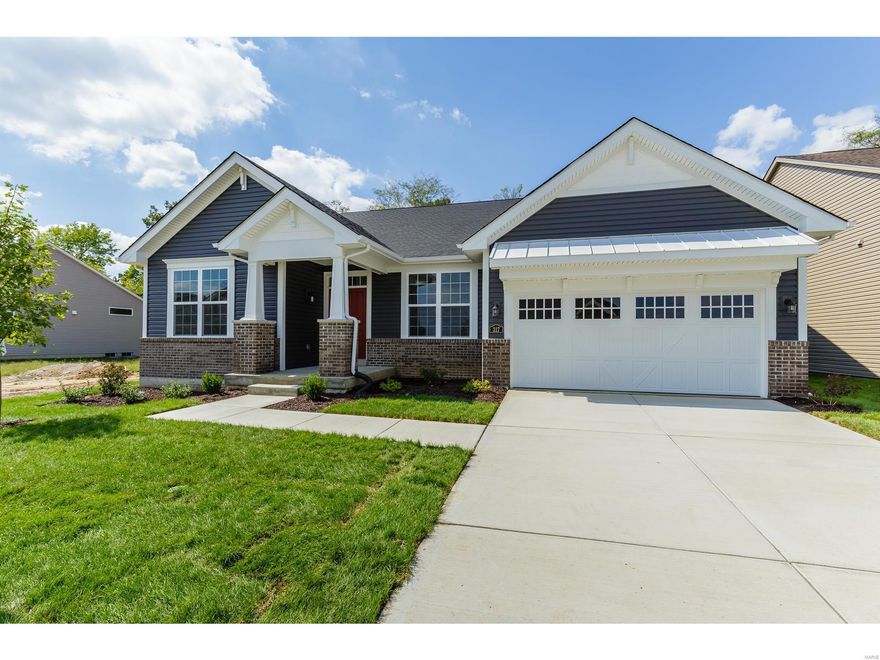 NEW CONSTRUCTION by Payne Family Homes in the rapidly selling Shady Creek, an amenity rich neighborhood with a resort-like lifestyle. This popular ranch has 3 BD, 2.5 BA & 2,161 s/f of open living space. Features inc 9’ clngs w/12’ in the Grt Rm-Café-Kit, gas FP, dbl stack cabinets in the Kit w/crown & hardware, st steel appl, Quartz c-tops, island w/brkfst bar, gas range, raised height vanities in the Mstr Bath, sep tub & shower, a centrally located Laundry Rm, laminate wood floors, R 38 ceiling insul, cust wall color, Jeld-wen Low E windows & R/I bath. There is a 3 car garage (tandem), a stunning elev w/stone, vinyl siding, arch shingles, coachlights, full yard sod & prof landscaping. Amenities inc a pool house, zero depth entry pool, lazy river, water sports court, lap lanes, miles of walking trails, 8 fitness stations & a childrens play center. Students will attend the highly-acclaimed Wentzville School Dist & there is easy access to Hwys 364, 40/61, shopping, restaurants & parks.