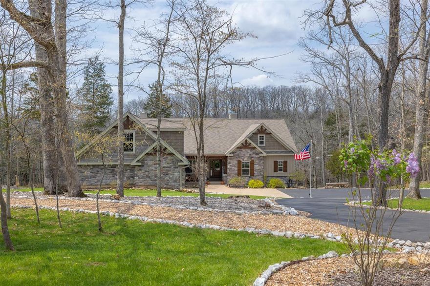 Welcome home to this stunning, TURNKEY move-in ready, waterfront home perched on the shoreline of 200+AC Lake Alpine in the desired gated Innsbrook community. 2.2 AC lot features 309’ lakefront views, cascading natural rocks on the hillside landscape, and a leveled walkway to lakeside landing & dock. 2 fire pit areas, outdoor shower, putting green, and hot tub. Main level open floor plan with custom hardwood floors and built-in shelving. A stone-wall wood burning fpl serves as artwork in the living rm. Chef’s kitchen has stainless steel appliances and an oversized island. Screened-in porch & covered deck offer views at every angle. The primary suite boasts 2 walk-in closets, an electric fpl, and a gorgeous in suite bath. The entertainers dream W/O LL includes wet bar, w storage rms, full bath,2 bd rms, stone-wall WB fpl, & in-home theatre rm. 3+ car gar has epoxy flooring &storage space for boats/UTVs (boat & 2 UTVs included in sale). Unfinished Bonus rm above gar w/electrical hookups. Additional Rooms: Sun Room