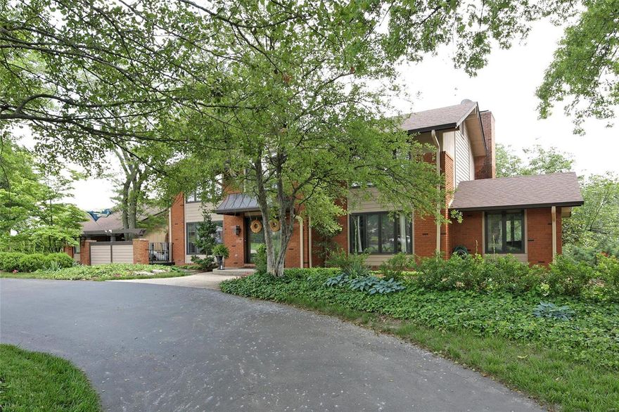 BEST VALUE IN CREVE CEOUR!  GREAT PRICE!  Beautiful updated 7 bd, 6 full and 2 half bath home on private one acre lot.  This expanded home offers over 5,000 sq ft on the 1st and 2nd floors and over 2300 sq ft in the walk out lower level.   Find and open concept with hardwood flooring throughout the 1st flr, updated custom kitchen, formal liv rm, din rms, fam rm with wetbar, TWO OFFICES, a main flr bedrm suite perfect for in laws or nanny and mudrm/laundry rm.  The 2nd flr offers a master suite with sitting area, custom bath with heated floor and walk in closet.  Four other bedrms, with 2 additional updated baths and loft/playrm complete the 2nd flr.  The walk out lower level is perfect for entertaining with its gas fireplace, 2 updated custom baths, mini kitchen/bar, workout rm, bedrm and large finished spaces to spread out.  Walk out to the beautiful updated pool from the lower level or one of the many first level glass doors.  4 car gar, newer roof, AC units, and more. Additional Rooms: Mud Room