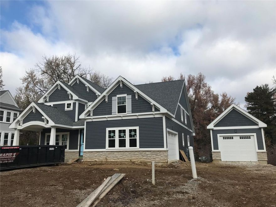 Spectacular new 1.5 story under construction by Boulevard Custom Homes.  This 4 bedroom, 3.5 bath, home features astounding finishes which include a 3-car garage, job stained hardwood flooring 1st floor and 2nd floor hall, gourmet kitchen with true custom cabinetry, large island and peninsula counter, crown molding, soft close drawers, 3 lazy susan's, pull-out spice rack, trash pullout, Quartz countertops, stainless steel appliances, under cabinet lighting, large walk-in pantry, built-in lockers, and impressive screened in rear porch.  12' high beamed ceiling in great room offers a fireplace, wine bar with wine cooler,  den/study with beautiful wainscot. Elegant master bedroom suite boasts coffer ceiling, large walk-in closet, adult height vanities, stand alone tub in master bath.  Other amenities include mahogany wood front door, wood treads on stairs, a expansive 2nd floor bonus room, 2 full baths on 2nd floor, large bedrooms with walk-in closets. Additional Rooms: Sun Room