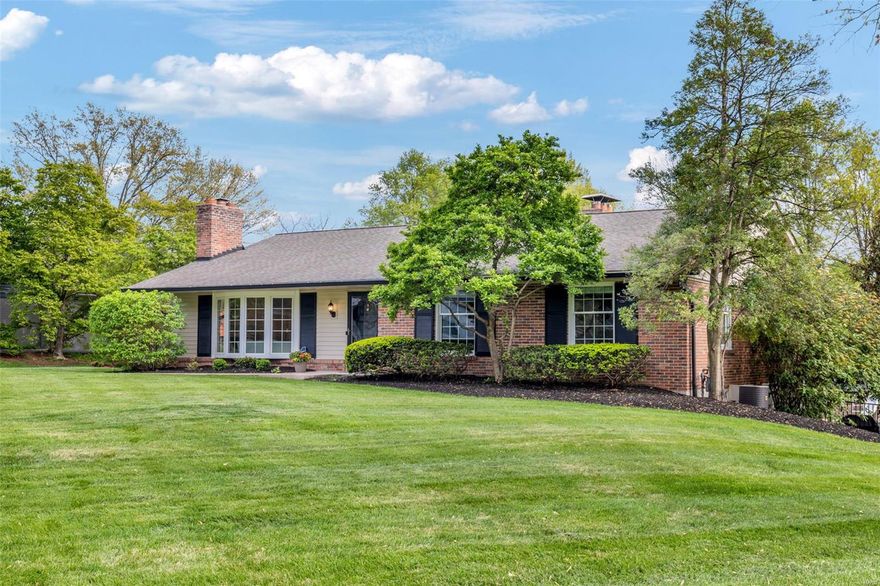 Welcome to your dream oasis in a coveted neighborhood, just moments from Hwy 40 and the upscale shopping and dining of Frontenac! This stunning ranch home is set on nearly an acre of beautifully landscaped grounds. Step inside to discover exquisite crown molding, bay windows, and gleaming hardwood floors throughout. With 5 bedrooms, including two master suites, and 4 bathrooms, this home provides ample space for your family. The upgraded kitchen is a chef’s paradise, featuring stainless steel appliances, beautiful granite countertops, and custom glass cabinets. It seamlessly flows into an all-seasons sunroom that overlooks a gorgeous stone retaining wall, lush trees, and a sparkling inground pool perfect for entertaining!The finished lower level boasts a walkout to the pool area, an updated kitchen, 5th bedroom, a full bathroom, and a spacious living room. This extraordinary home combines luxury with charm, creating an ideal sanctuary. Enjoy entertaining all summer long! Welcome home!