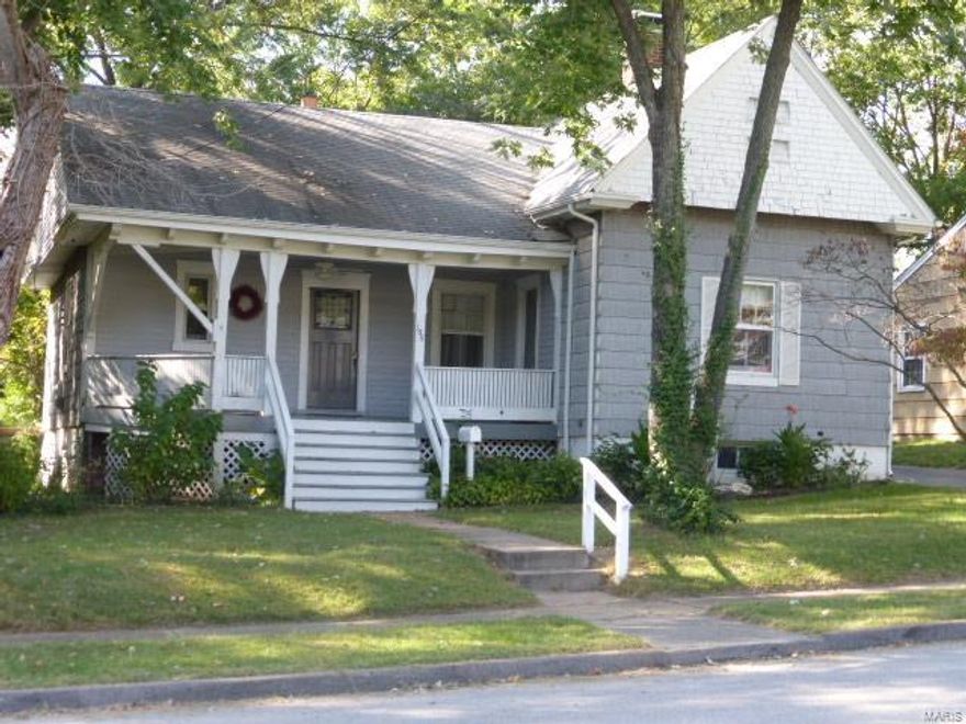 Charming home on a cul de sac with an open front porch. Large living room accented with a wood burning fireplace. Large master bedroom with dutch door overlooking the front porch. Newer carpeting. Tall ceilings throughout. Office in rear overlooks beautiful back yard. One car detached garage. Hardwood floors in most rooms in need of refinishing. Mud room in rear leading to the backyard. Additional Rooms: Mud Room