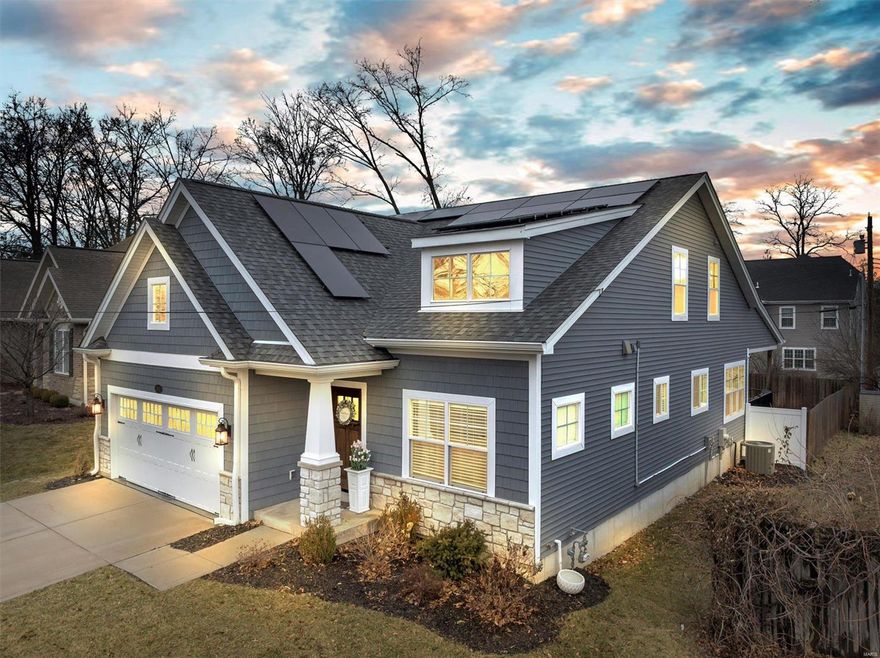 4 years young, this stunning 1.5-story is the epitome of luxury w/ 3,447 sq/ft of premium upgrades & located in the sought-after Des Peres area & Kirkwood School District! Hardwood floors welcome you to a large, well-lit dining room. Pass the powder room on the way to the open living room w/ a stone fireplace. The eat-in kitchen boasts SS appliances, a gas stove, abundant cabinet & pantry space w/ access to the covered patio. Continue to the main floor master suite enhanced w/ a coffered ceiling, a double vanity & large dual shower. Head upstairs where 2 spacious bedrooms are joined by a Jack & Jill bath. The lower level hosts its custom bar w/ quartz countertops & top tier KitchenAid appliances, 2 bedrooms, a full bath & a sizable rec space. The fenced-in backyard offers privacy & a perfect place to host w/ 2 patios & custom landscaping. Just 2 minutes walking distance from Pioneer Park w/ nearby restaurants & shops, the home & its surroundings are bursting w/ abundance!