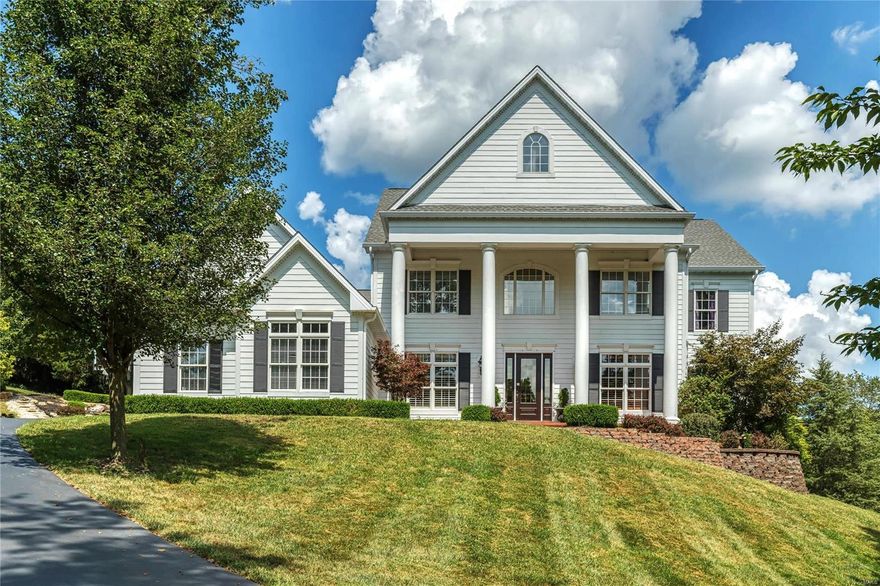 Classic 1.5-sty Colonial on 3-acre grounds. Distinctive design elements & custom amenities including oak hardwoods, extensive millwork, 10’ ceilings & energy efficient geothermal systems are featured throughout the home. Dramatic 2-sty hardwood foyer leads to private study, elegant dining room & stunning great room with architectural columns & cast stone fireplace. Spacious open kitchen with granite countertops, 42” natural cherry cabinetry, premium appliances & butler’s pantry adjoins light-filled breakfast room & vaulted hearth room with stone fireplace, built-in storage cabinets & 2 sets of French doors that open to patio. Main floor master bedroom suite with wide bay window & luxury bath offers an appealing retreat. Front & rear staircases access 3 additional bedrooms, 2 with ensuite baths, plus bonus room & full bath. Situated on a professionally landscaped lot with paver patio, waterfall, Koi pond & oversized 3-car garage. Baskin Farm Equestrian Facility is just a few steps away.