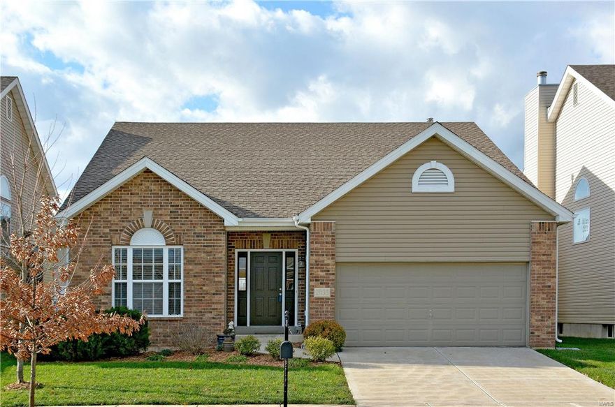 Want villa style living without the fees? This is it! The cost of monthly exterior maintenance is estimated to be less expensive than the villa monthly fee (based on $30 grass cut). Hardwood entry leads you to the VAULTED great room w/a wood burning FIREPLACE. Perfect for those romantic winter nights. NEW CARPET & FRESHLY PAINTED THROUGH OUT! Open floor plan flows into the kitchen & breakfast room. Kitchen updates include hardwood floors, GRANITE counter tops, stainless steel appliances, 42" cabinets w/CROWN molding & LARGE butterfly island. 9 FT CEILINGS on main & lower levels! The divided bedroom floor plan offers 2 ample sized bedrooms & COFFER ceiling master bedroom suite. This suite, with walk-in closet, has a private bath w/separate tub & shower & double bowl GRANITE vanity top. IN-GROUND SPRINKLER SYSTEM! This home is conveniently located to parks, many walking trails & a stocked lake. You are minutes away from shopping, restaurants, nightlife, schools & major commuting routes.