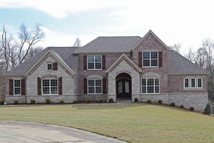 Custom Inventory Home just completed on one of Olivette's finest home sites! Private 1.26 acres at the end of a cul-de-sac. Exceptional quality & high end finishes by Clement Construction Co. Full brick & stone front elevation. Iron entry doors. 9' ceilings on all 3 levels. Large den with Judge's Panel. 2 story great rm with floor-to-ceiling stone fireplace. Cased windows & extensive crown moldings. Handcrafted wood staircase. Thermador Professional appliances include 48" fridge, gas range & electric oven. Quality full overlay cabinetry, under cabinet lighting & exotic granite countertops. Luxury master bath w/custom tile & granite finishes, freestanding tub & expanded shower. Huge master closet w/custom organizers. Finished walkout lower level w/rec rm, bedroom, 1.5 baths and wet bar. Energy saving Low-E windows, 90+ efficient dual zoned Lennox HVAC & Tankless water heater. Huge 3-car garage. Low maintenance composite deck. Irrigation system & landscaping. Great Location, Don't Delay! Additional Rooms: Mud Room COOL: 14 SEER+