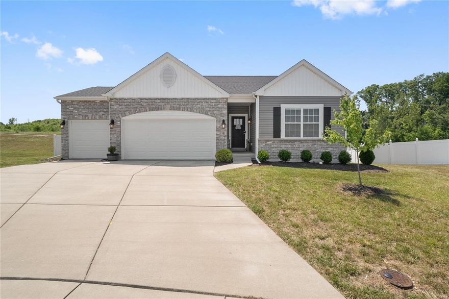 HOME is SOLD Spectacular Lombardo Built Ranch offers an open floor plan with almost 2,000 sq ft of exceptional craftmanship throughout! Impressive entry foyer leads into the formal dining room & stunning great room overlooking the chefs kitchen with upgraded white 42'' staggered cabinets, crown molding, roll out shelves, subway backsplash, stainless steel appliances, gas stove, large center island and quartz countertops. The master bedroom offers an appealing retreat with a luxury bath with tub & shower & walk-in closet. Completing the upstairs are 2 additional bedrooms & full bath. Additional features include beautiful wood floors, wrought iron spindles for the open staircase, main floor laundry, privacy fenced yard, lookout lower level with windows, plus an oversized 3 car garage & located on a cul-de-sac.   Home kitchen refrigerator.