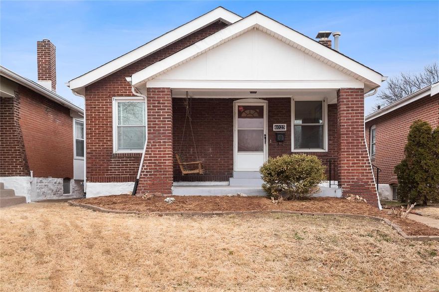 Charmingly cozy brick bungalow in the Tower Grove South Neighborhood. This quaint and affordable home offers 2 spacious bedrooms, decorative fireplace, hardwood floors, Central Air Conditioning,a 1 Car oversize detached garage with automatic door and remotes.  Great patio and fenced yard for pets, outdoor activities and entertainment. immaculate basement that offers walk-out access. The warm and inviting floor plan offers a sitting area off the Master Bedroom perfect for office, with a unique bay window off of the the dining room.  A 1 year HSA Home Warranty is offered. Convenient location near schools, public transportation, minutes from downtown St. Louis and Tower Grove Park.