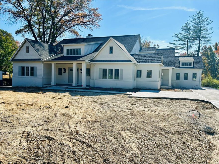 Step into style with this impressive New Custom Home! 5 bed 5.5 bath 1.5 Story home with exquisite finish.Gorg. kitch.feat.10.5 foot doub. mitered Qtz island w/sub -zero/wolf appl.,2 dish., 2 bev. drawers. Lar. walk-in pantry & sep. scullery. (wine frdige/dbl.ovens/sink)Kit. opens to breakfst.& beamed grt.rm. limest. FP & a sep. bar perf. for enter.Mn fl. vault.primary suite feat. linear FP & private patio w/2 large closets (W/D hookup) & lux 17x13 bath w/bev. center. Fabu. vault.cov. area feat. bluestone w/FP and built-in barb. 3 beaut. en-suites up w/ Laund.rm. LL boasts 2,400sq.ft of fin. sp. w/wetbar and builtin cab. lots of space for games and enter...incl. one room pre-wired for a theatre, add. room could be used for golf sim. w/10 foot celings. and 3rd rm room w perfor. flr. for home excer. LL bed/full bath too! 39 x25 ft. 3 car garage w/220 volt EV Charger. Mud w/cust. locker area, 3 add. park spaces in front.Sec. system w/mult. cam.Duplicate Listing #24049509 Additional Rooms: Mud Room