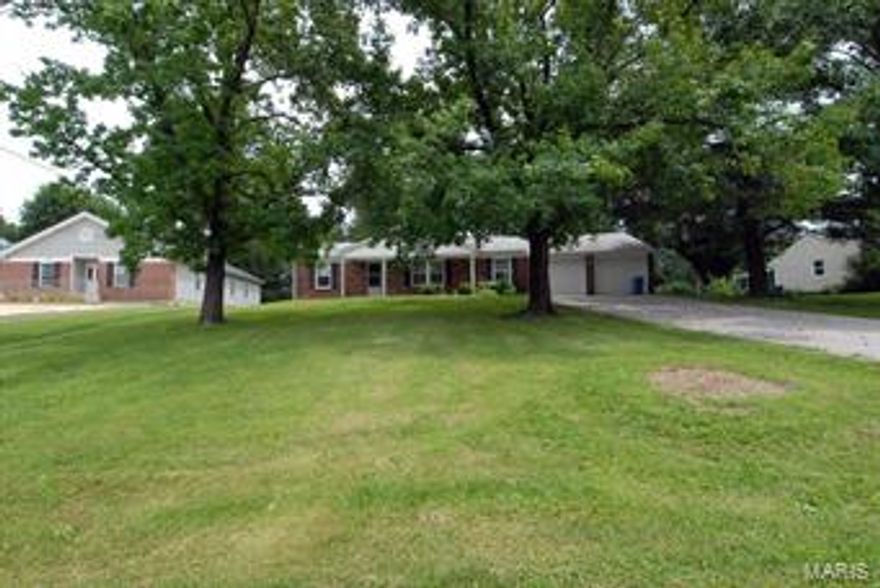 Located in Wilcox Place subdivision, you'll love this 4 bedroom, 2 bath, ranch style home. Very well maintained home! Enjoy the benefits of a huge yard without all the work (landlord's existing lawn service will cut the lawn). Quiet cul-de-sac street just 1 block from Woodsmill & Manchester Roads. 2 car garage. Beautiful wood floors and brand new carpet throughout. Neutral decor. Spacious living and separate dining room. Kitchen offers lots of cabinets and is open to den with fireplace. Fenced back yard, 2026 square feet of living space upstairs plus a unfinished basement. Available for occupancy immediately. $1550 first month rent and $1550 security deposit, both due upon acceptance. One year lease minimum. All utilities are at tenant expense including sewer, water and trash. Pets are negotiable with possible pet deposit, depending on number and size. This home is strictly for rent and is not available for lease purchase or option to buy.