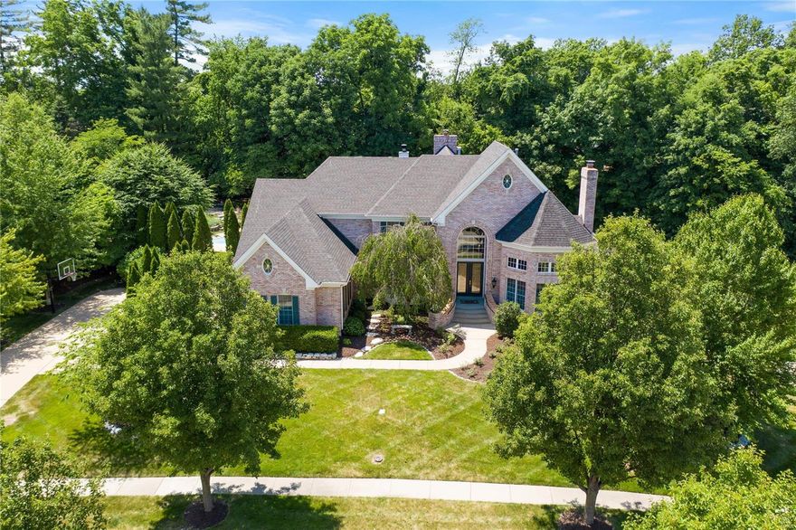 *Accepting Backup Offers* GORGEOUS hickory hardwood floors, Marble Floors, energy efficient LED lighting, & SO MUCH MORE! Magnificent 1.5 story 4 BR, 5 Bath home. Great room w/floor to ceiling arched windows, gas fireplace, & wet bar. Completely renovated Chef’s kitchen! New Sub Zero,Wolf, Dacor & Bosch Appliances, center island, breakfast bar, granite counters, butler’s pantry & walk-in pantry; Vaulted hearth room w/3rd fireplace. Stunning main floor Master Suite; 2 walk-in closets w/custom organizers, spa-like bath w/marble flooring, whirlpool & Custom walk-in shower! 2 spacious bedrooms upstairs w/Jack & Jill Bath. Loft/Sitting area. Finished walk-out LL continues to captivate w/4th Bedroom Suite, Full Bath w/custom walk-In Shower, spacious rec room, media room w/THX surround sound, 4th fireplace, wet bar, workout room w/ indoor batting cage. Enjoy the sunset entertaining in your private backyard Pool oasis. Lush landscaping,spacious level yard including elevated patio w/waterfall.