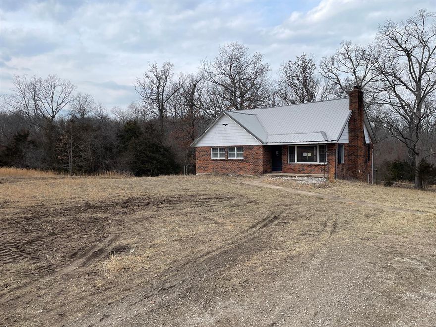 Wow! This ranch style home sets on nearly 50 acres of land just a few minutes from I-44 and the Fort Leonard Wood military installation. Featuring two bedrooms and one full bath on the upper level, an additional bedroom and bath on the main level, and then a full basement that is partially finished and includes a separate kitchen area. All of this plus a three car detached garage. Due to condition, all who enter must sign a hold harmless. MULTIPLE OFFERS HAVE BEEN RECEIVED AND ALL HIGHEST AND BEST OFFERS ARE DUE NO LATER THAN 1:00 PM CENTRAL 3/8/24. SpecialListingConditions: Foreclosure
