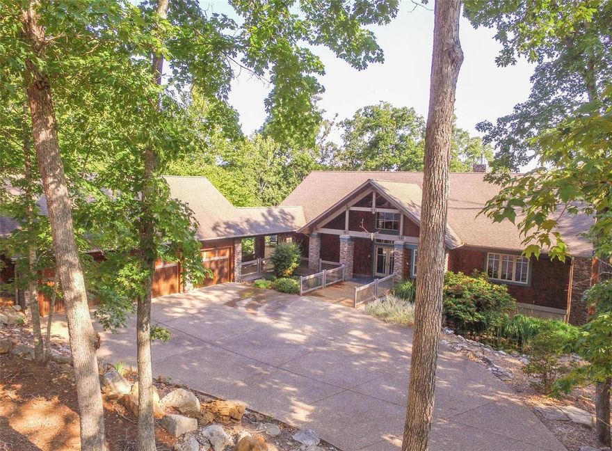 WOW! LAKE ALPINE! This custom home is an innovative design that takes advantage of the natural light and beautiful lake vistas. Custom home features 4 bedrooms, 3.5 baths, multi tiered decks with panoramic views of lake Alpine, all allowing for an abundance of outdoor entertaining venues. As you enter the home, you are greeted with a grand entry hall featuring cedar lined, wood beamed  ceilings, stone accent columns and hand finished Australian Cypress floors. This open design takes advantage of the unobstructed views of lake Alpine and provides the perfect home for entertaining family and friends. The Spacious open kitchen provides plenty of counter space and storage and a breakfast area, perfect spot for your morning coffee. The finished lower level walk out provides plenty of recreational amenities with a spacious rec room with wet bar, leading to a patio overlooking the lake and the private lakeside dock and landing. Some furniture and water toys available