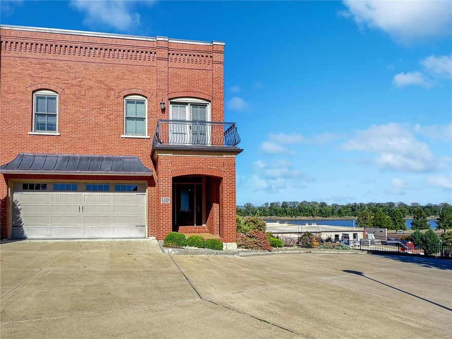 This Townhome offers a perfect blend of style, functionality, & comfort in the heart of Downtown Washington, MO. Missouri river view. The three levels of living for multigenerational living complete with a caged elevator, offers practicality & a touch of luxury. The main level features a gorgeous kitchen with a large island & a built-in bar area, which is an ideal space for entertaining.  Also on the main level which further enhances the living experience is the screened porch & grilling area. 2nd floor appears to be well thought out, providing flexibility with an open area for an office or additional living space. The Main Bedroom suite with a door to the upper deck, his and hers closets with custom organizers, & a spacious main bath with double sinks, a large L-shaped walk-in shower, & a jetted tub contribute to the comfort & elegance. LL has a fantastic entertainment area, bar, & plenty of storage. The walk-out to the patio & expands the usable space. End unit with a yard area! Additional Rooms: Wine Cellar