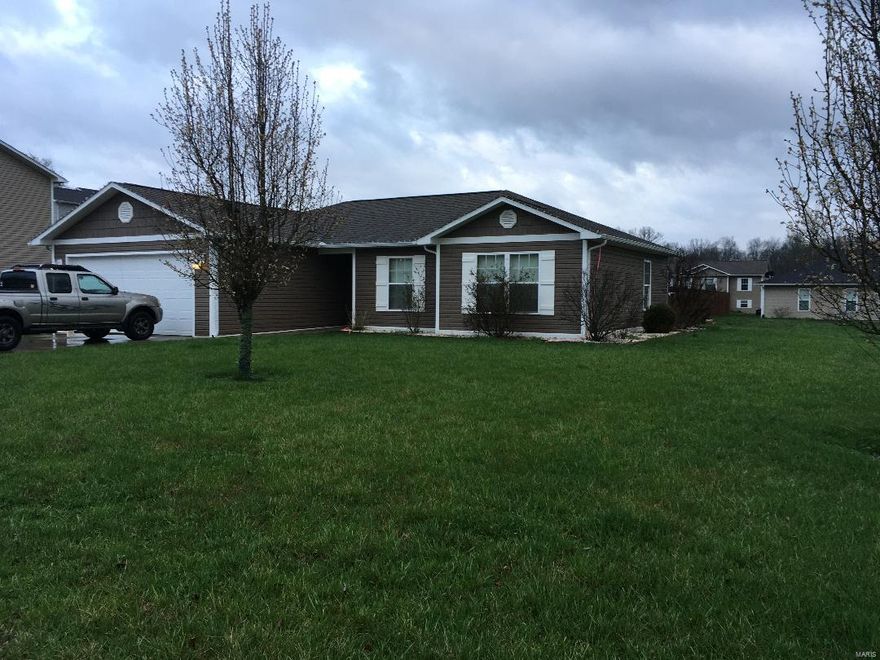 This 8 year old home is as lovely as they come!  3 bedrooms, 2 baths.  Hardwood floors in living room and hallway.  Ceramic in kitchen and carpets in the bedrooms.  This area sales fast.