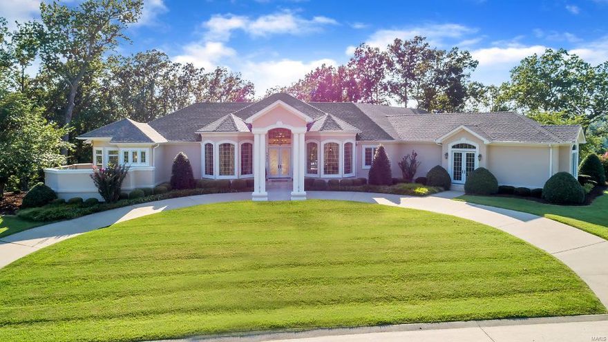 THIS SPECTACULAR European styled ranch home has been designed for living comfortably, yet set up for entertaining in style! The 1.51 acre property has been manicured to perfection and freshly landscaped by the current owners for enhanced views and beautiful greenery/blooms to enjoy! When you enter the home's magnificent front foyer, you will be amazed by the abundance of natural light flowing throughout this home and the unique custom features it boasts. You'll love the high volume ceilings, open floor plan, and spacious custom kitchen with Viking appliances, breakfast bar and full prep island. The main level master suite includes a walkout to pool area and spacious master bath with custom built-ins, steam shower, and his/her walk-in closets. The main level floor plan offers two additional bedrooms with ensuite baths. The back yard oasis is made for relaxing with in-ground salt water pool, expansive lanai, wet bar, and your choice of music on the home's surround sound. A MUST SEE!!