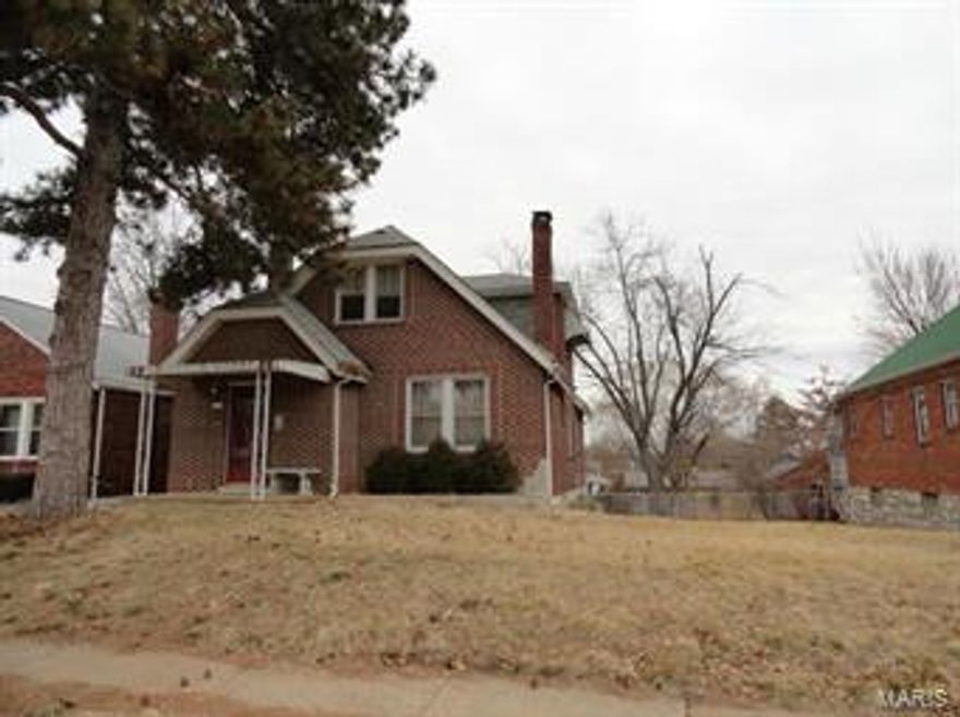 Rare Find!!  Affordably priced 4 bedroom home with 1.5 baths.  Nicely updated Kitchen with maple cabinets, granite countertops and ceramic floor.  The rest of the home has beautiful wood floors throughout!  Large Living Room with fireplace flanked by two stained glass windows.  One of the four bedrooms is on the main floor along with the half bath.  The 2nd floor provides the 3 additional bedrooms with lots of closets and a full bath.  The basement has great space and ceiling height and is ready for your finishing touches.  Enjoy the large 54' wide lot and 2 car garage.  Garage to be sold in as is condition.  Make your showing today!