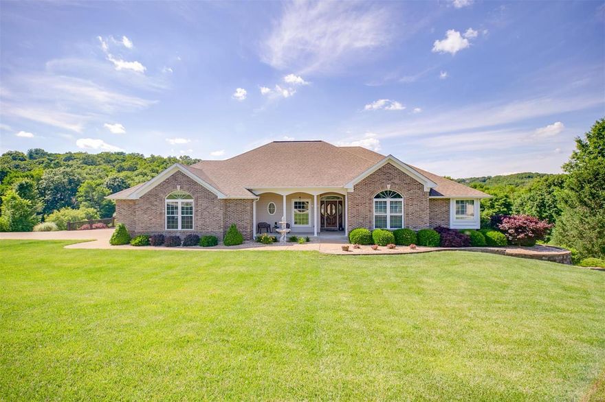 Astounding Custom Built One Owner Ranch Home on 1.19 Park Like Acres! This meticulously maintained home is sure to impress w/ it’s upgrades, updates & over 3300 sq ft of finished living area! Bright open Great Rm with beautiful hardwood floors, 10’ ceilings, custom crown mold, custom wall of windows, ceiling fan & wood burning fireplace. The unsurpassed Kitchen has been totally remodeled and is sure to dazzle you with it’s custom 42” cabinets w/crown, granite counter tops, center island breakfast bar, custom tile backsplash, walk-in pantry & stainless appliances. Master Ste boasts cathedral beamed ceiling w/ceiling fan, dual closets, exquisite Master Bath w/ separate adult height vanities, whirlpool soaking tub & w/in shower. The 2 adtnl bedrms are spacious and share a Jack & Jill bathrm. Super sharp walk out fin Lower Level is perfect for entertaining, prof built cocktail bar w/ built in cooler, ice maker & microwave.The 26x25 drywall finished side entry garage is sure to WOW you!