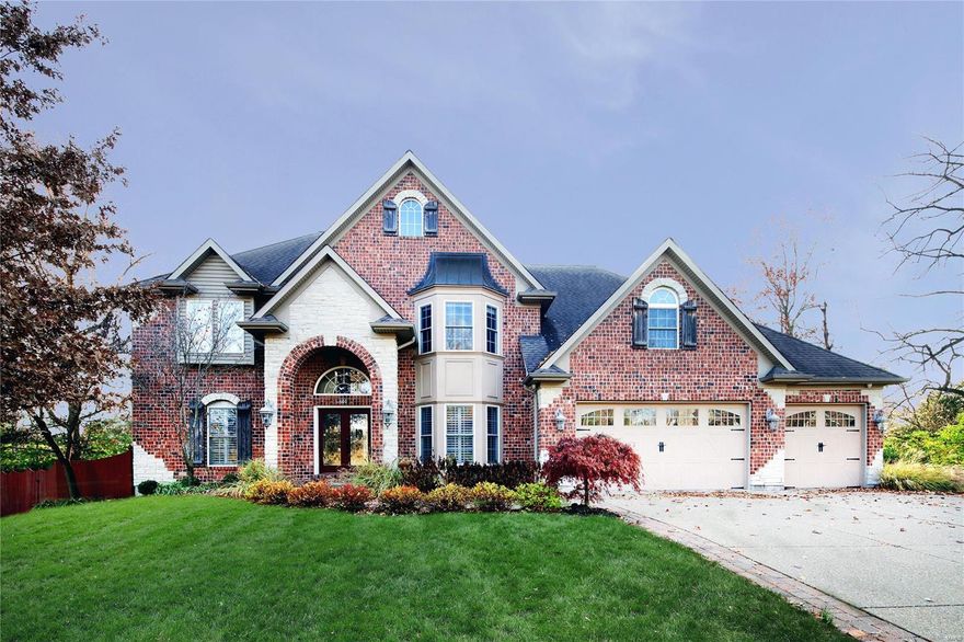 This fabulous Kirkwood home will suit all your possible needs! The entry and soaring great room welcome you with walls of windows, architectural columns, crown moldings, coffered ceilings and bay window. Updated kitchen boasts a center island with breakfast bar, stainless Thermador appliances, a Subzero refrigerator and a planning desk. The kitchen area opens into a sunny breakfast room overlooking the private brick patio and a comfortable hearth room with gas fireplace. The main floor master suite offers a lovely oasis with its updated bathroom with double vanities, separate tub and shower and large walk in closet. The bright second floor offers four additional bedrooms, two with ensuite baths, plus a spacious open family room area and a bonus room perfect for play. The lower level an added bonus with a wonderful recreation area, a separate exercise room with a full bath plus a media room with wet bar. The level yard and great location tells you this home really does have it all!