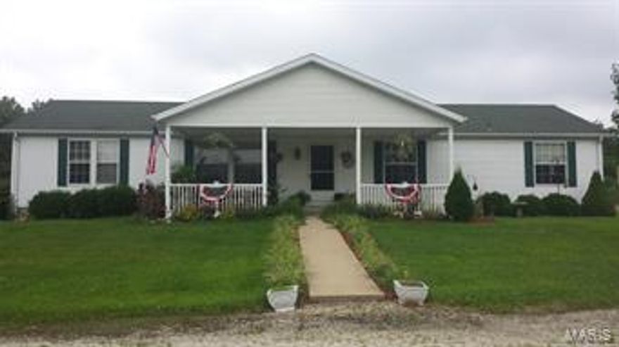 Looking for Peace and Quite! This awesome MTG home on permanent foundation feature 3.48 Acres with 4 Bedrooms, open with split bedroom floor plan.  The cover front porch with a swing and 12 x 22 sun room offer the opportunity to enjoy country living at it's best.  The property is nicely landscaped, large patio, arbor and 30' Dough boy pool is perfect for entertaining friends and family.  Every Man's Dream, 3 car 36 x 36 detached garage/workshop with concrete floor, electricity.  The circle drive provides easy access. The vaulted ceilings and sky lights lets the outside in providing a lot of natural light.  Kitchen is a amazing,  the breakfast bar, stainless steel appliances & stainless steel down draft over the cook top stove, built in oven and microwave.  Large master suite with walk-in closet and beautiful on suite with double vanity, separate shower and garden tub.  This home has everything for everyone!  You have to see it...to believe it.  Let's schedule your showing today! Additional Rooms: Sun Room
