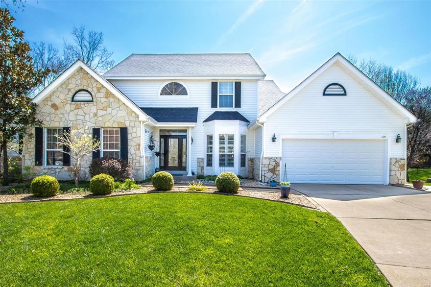 Desirable Muirfield Subdivision offers this home nested on a gorgeous double culdesac lot with large level yard overlooking trees & woods.  1.5 Story~ Owners suite on the main level.  Home office with built in bookcases & storage closet. Formal dining room with custom wood wall & hardwood floors. 2 story great room with wood floor, stone fireplace and view of fantastic yard. The kitchen offers light & bright updated cabinets, heated wood floor in sink area, study center with cabinets, walk in pantry with wood shelves. Main level laundry & mud room. Owners suite with luxury bath, updated with coastal blue cabinets - spa retreat, walk in large closet.  Three additional upper level bedrooms PLUS finished walk out lower level with office/playroom or exercise room, family room for TV and video game space and a rec room/game area, kitchenette, full bath. Tons of storage space. Decks for cooking & entertaining - enjoy the outdoor living and a short walk to the subdivision pool & cabana.