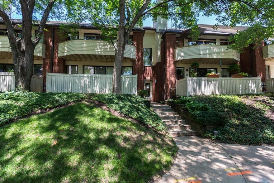 A lifestyle that offers the best of both worlds - walk to Forest Park & Metro Station plus a quick commute to the vibrancy of the CWE and The Loop - this 3 bedroom and 2 full bathroom condo is a gem. The open design living & dining room with vaulted ceiling & wood burning fireplace is warm & inviting. A wall of windows & sliding door opens to a private balcony - perfect for outdoor enjoyment & entertaining. The eat-in kitchen has abundant cabinetry & a custom built-in breakfast area. Two well sized bedrooms, full bathroom & main level laundry completes this floor. The master suite, on the 2nd floor, w/10 ft ceiling and 2 prof. organized walk-in closets plus an additional bonus storage area & private balcony - is a perfect hideaway. The master bathroom has 2 vanities & a private commode. All the closets feature St. Louis Closet Company custom systems. The 2 car attached garage & storage room completes a lifestyle that is simultaneously comfortable & elegant. Location: City