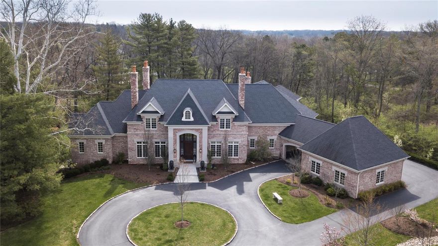 This private exquisite newer construction home offers every luxury and amenity one would expect in a home of this caliber.  Bought as a 'white box' and painstakingly finished by the current owners in 2013, this custom home offers timeless high end finishes at every turn.  European wide plank hardwoods, soaring ceilings, walls of French Doors leading out to the terrace and 1 year old salt water pool with spa and fountain are just some of the highlights of this gorgeous home.  The open kitchen flows seamlessly into the family room with beamed ceiling and stone fireplace.  The luxury main floor master suite offers a fireplace and his/her closets.  4 large bedrm suites and loft are found upstairs.  A gaming rm, bedrm and bath complete the large partially finished walk out lower level.  The private professionally landscaped grounds are accented by outdoor entertaining spaces with fireplace.  This home has everything today's buyer is looking for, even room for a future elevator. Additional Rooms: Mud Room