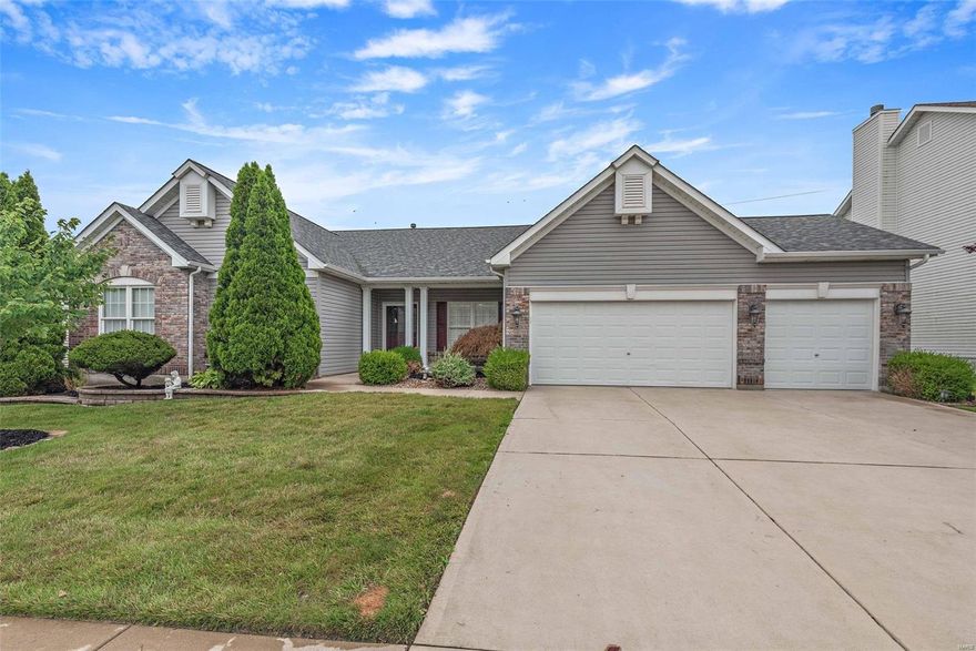 This BEAUTIFUL 3595 sq ft, 3 bdrm ranch welcomes you with an open floor plan and vaulted ceilings. Decorative columns surround the formal dining area, with a gas fireplace in the living room.  The family area has hard wired surround sound, and hardwood floors. The kitchen includes an island and raised bar top, that opens to breakfast room.  Main-floor laundry.  The Master Suite includes 2 walk-in closets, and the master bath has dual sinks, jetted tub and separate shower. Open office area on main level.  The finished lower level is ready to entertain with a family/entertainment area with custom built-ins, adjoining the game/recreation area with bar and half bath.  The unfinished space is ready for your finishing touches with plenty of room left for storage.  The lower-level walks out to the patio area with steps to the deck off the main level family room.  Newer roof, siding & gutters (2016). 3 car-garage. Francis Howell Schools. Close to Veterans Tribute Park. Additional Rooms: Mud Room