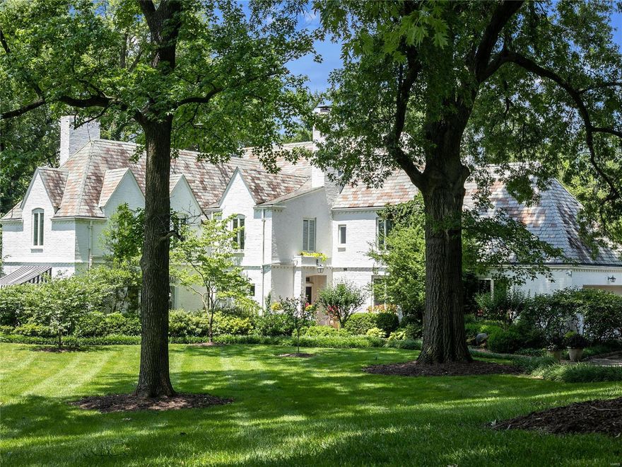 Effectively situated at Town and Country/Frontenac. Country Club adjacent. Quick access to the best private schools. This manse has set the bar for the allure of its architecture and formal gardens for generations. The home hosts an open original floor plan with a conservatory/family room addition. Built as painstakingly as a European Castle, this home includes a concrete bunker like first floor guest bedroom/office suite! Original yet updated kitchen hosts gorgeous cabinetry, stainless counters and impressive butlers pantry. Charming large living room sits 3 sides exposed to masterful gardens and offers massive fireplace. Spacious dining room overlooks courtyard. Family room-sunroom is an architectural wonder with soaring ceilings and panoramic views. Brick patios encircle home. Rehabbed master bedroom and bath are as posh as a fine Inn. Master hosts a cozy lounge with fireplace. Large Jack and Jill bedrooms share bath. 5th bedroom has en-suite bath. Enormous storage room and attic. Additional Rooms: Sun Room