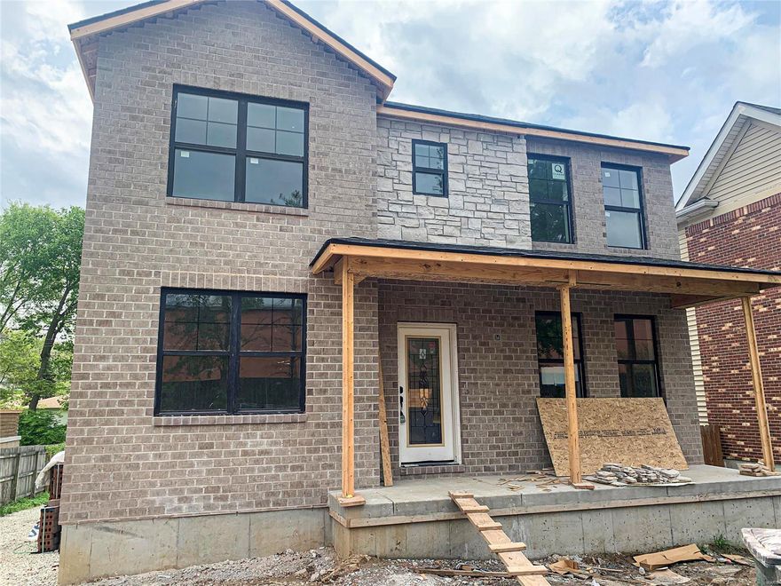 Gorgeous new construction home centrally located in desirable Richmond Heights. Clayton schools! Offering a plentiful five bedrooms, four and a half baths brick home with a fantastic open floorplan. Rustic & durable hardwood floors throughout the main living area. Fabulous kitchen with huge island is open to breakfast room and anchored by family room with fireplace. Kitchen is truly a cooks/entertainers dream with plenty of surface space and 42 inch cabinets, gas range & stainless steel appliances. Convenient half bath and mud room plus separate dining and den. Upstairs you will find four spacious bedrooms, three full baths and laundry room. Master ensuite is huge with plenty of closet space. Relaxing spa-like master bath with lots of light, freestanding tub, custom tile work and additional storage. Two car detached garage. Lower level features an additional bed and full bath with egress and a large family room. July completion. (Interior pictures are coming soon)