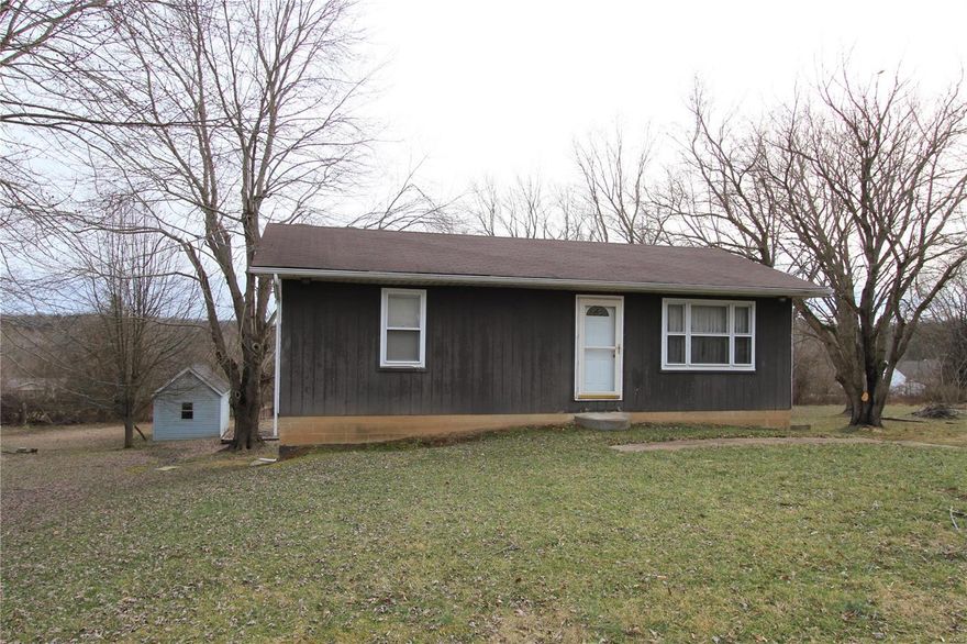 Cute starter home with lots of potential. Invest in your future, you couldn't rent cheaper than this purchase. Home sits in quiet neighborhood on half an acre in a great school district.