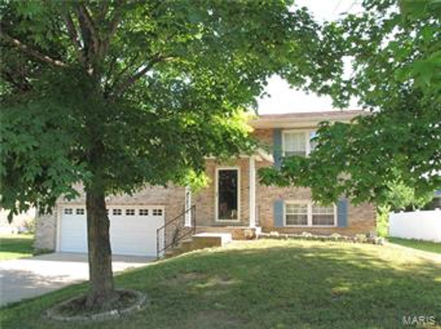 Stunning home is loaded with UPDATES - Newer roof, furnace, kitchen and baths to mention a few.  That is just on the inside!  This home has a gorgeous back yard for keeping the kids occupied while you are entertaining family and friends!