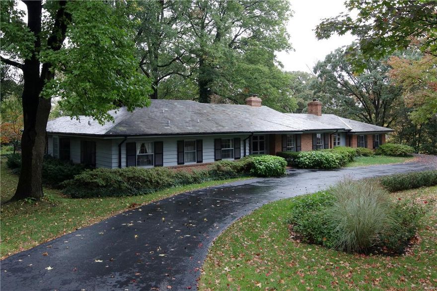 Exceptional opportunity in Ladue to renovate this "as-is" property or build on a simply stunning lot overlooking the 11th tee box of Old Warson Country Club golf course. Three bed, 4 bath home has a gracious floorplan, beautiful millwork and one of the loveliest lots on Trent Drive! The home boasts an updated kitchen and a welcoming Higginbotham-built master suite addition. The large living room has floor to ceiling windows, a family room with vaulted ceiling and a club-like library nearby.The updated kitchen features custom cabinetry, a granite-topped center island and an adjoining breakfast room overlooking the patio and opening to a stunning screened porch with vaulted wood ceiling. The newer, Higginbotham-built master suite is bright and welcoming, with updated bathroom and large, well-appointed walk-in closet. The 2-plus acre grounds are nothing short of stunning, with a picturesque pool, charming fountain and lovely views in every direction.