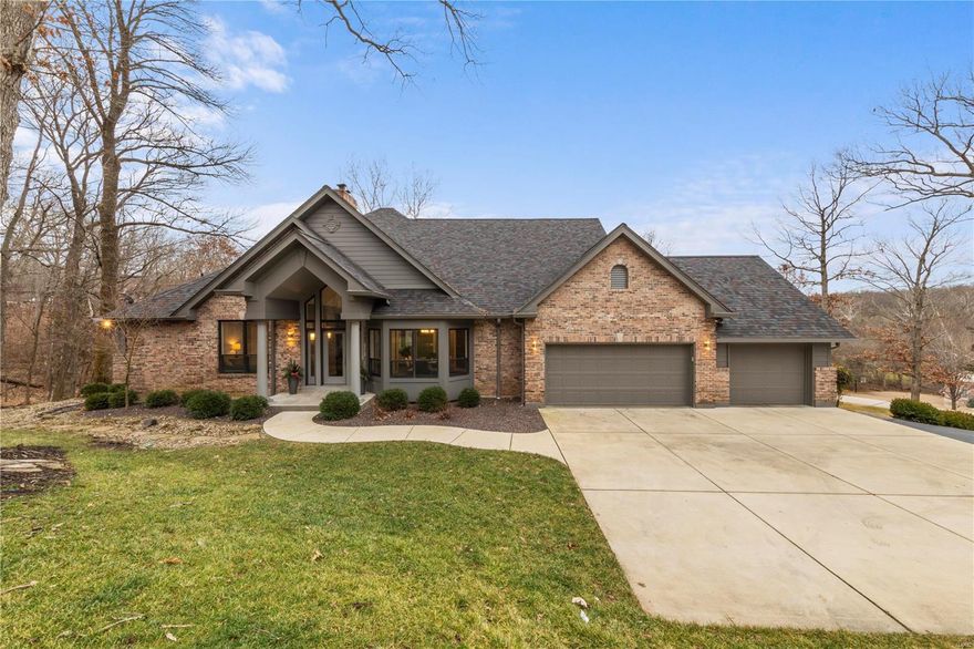 Imagine waking up everyday to the stunning, scenic views this 6 bd, 4 bth home has to offer. The open fp features soaring ceilings, hw floors, brick frpl & window walls that provide picturesque views. The state of the art ktcn has all the designer features you would expect:quartz waterfall countertops, breakfast bar, center island & top of the line appliances. Also on the main level you will find an exquisite master suite complete w/2 walk in closets, a spa-like bath with soaker tub and separate vanities. The LL offers a 2nd entertaining space w/wet bar, frpl & access to the outdoor oasis which features a paver patio & firepit. The LL offers 4 more spacious bdrm and 2 full baths. The energy efficiency will also blow you away! All electric appliances, new geothermal units(10/16) & almost all LED lighting provides extreme efficiency & very low electric bills. Other features:3 car garage, Hardie Board siding. Don’t miss the opportunity to own this extraordinary 4,500+ sf family retreat