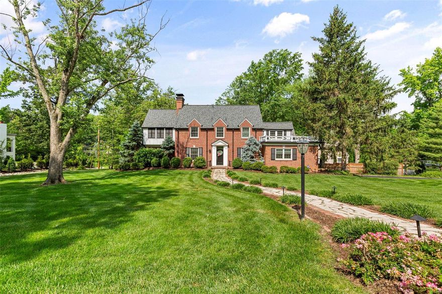 Charm and character abound in this lovely home, nestled perfectly in one of Ladue's premier lanes.  A cobblestone path leads you to this all brick home that has been lovingly updated by the current owners.  The slate entry is flanked by the oversized dining room and captivating living room, featuring a wall of built-ins, custom window seat, and new gas fireplace.  The kitchen has plenty of counter space, stainless appliances, island seating and opens to a light-filled hearth room.  The first floor also has a spacious studio that can easily be converted to a bedroom.  Upstairs is the attractive primary suite with large dressing room and spa-like bath, along with two guest rooms that share a jack and jill bath.  Updates include: new roof, new windows, new boiler, multiple new AC units, updated electrical, new hot water heater, new drainage, the list goes on and on.  Current owners have truly breathed life into this endearing home while preserving the historic essence.