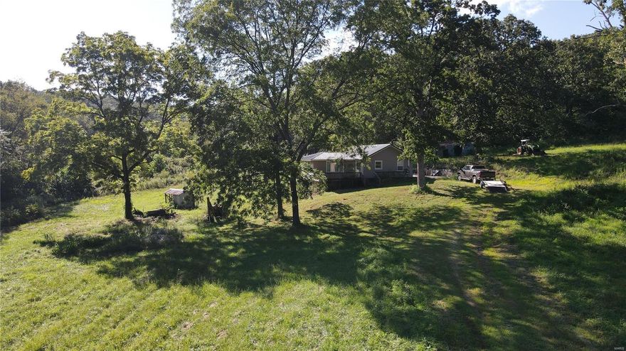 New Listing! Located just south of Marble Hill, MO sits this 1199 sq ft. cabin on 38 acres m/l. The property is very secluded with its own private entry and a 2 acre m/l stocked pond/lake on the tract. Offering great hunting opportunities, with the majority being wooded allows for excellent deer & turkey populations. A private well is included on the property and the cabin would make for a great weekend getaway or residence, while being just a few miles south of Marble Hill, MO. The stand of timber on the property is primarily hardwood timber and does have a few acre open field in front of the cabin.