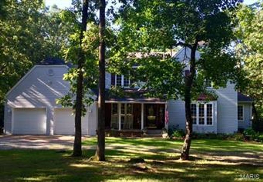 BEAUTIFUL & SPACIOUS 2 STORY HOME WITH 4 POSSIBLY / 5 BEDROOMS, & 3 1/2 BATHS.  LOVELY PRIVATE SETTING WITH 2.21 WOODED ACRES WITHIN WALKING DISTANCE TO THE GOLF COURSE.  DISPLAYS 2 FIREPLACES, A WONDERFUL KITCHEN/BREAKFAST AREA WITH NEW RANGE/DOUBLE OVEN WITH MATCHING STAINLESS REFRIGERATOR, DISHWASHER, & MICROWAVE.  THERE IS SPACE GALORE WITH A LARGE LIVING ROOM, FORMAL DINING ROOM, HEARTH ROOM WITH OFFICE AREA.  OFFERS LARGE MASTER SUITE AND GENEROUS SIZED BEDROOMS.  LOWER LEVEL HAS AN AWESOME FAMILY RM WITH SECOND FIREPLACE, REC AREA WITH WET BAR, LARGE BONUS ROOM WITH CLOSET COULD BE 5TH BDRM (NO WINDOW), AND A 3RD BATH.  RELAX ON THE OVERSIZED DECK WHILE WATCHING THE CHILDREN PLAY IN THE AMAZING TREE HOUSE.  THERE ARE PLAY, PICNIC, AND FIRE PIT AREAS IN THE LARGE YARD.  THIS IS A TREMENDOUS PROPERTY WITH SOMETHING FOR EVERYONE TO ENJOY.  COME VISIT THIS GORGEOUS PROPERTY SURROUNDED BY TREES AND NATURE AND JUST MINUTES FROM TOWN.