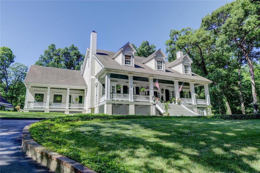 A rare opportunity in Huntington Forest, A gorgeous 6-bedroom, 7-bathroom home on 2.13 acres.  Sophisticated finishes welcome you as this home boasts full covered porches that overlook your private park-like setting w/small lake. 11’ceiling on the main, gorgeous Brazilian cherry hardwood floor, formal dining & living room, updated kitchen w/ custom cabinets, massive center island, granite, 2 sinks, 2 ss dishwashers, & butler/walk-in pantries.   The main floor master bath has been updated with new tile flooring, walk-in shower, soaking tub, & walk-in closet w/closet organizers, & center island.  On the second level you will find 4 bedrooms, w/walk-in closets, 4 ensuite baths, & a mother-in-law quarters w/ private entrance. 3rd floor also has a finished room. Main floor and 2nd floor laundry. There is a screened in porch across the back of the home, vinyl privacy fence surrounds the back yard a large inground pool with a fence that surrounds it.  Oversized garage and carriage house. Additional Rooms: Mud Room